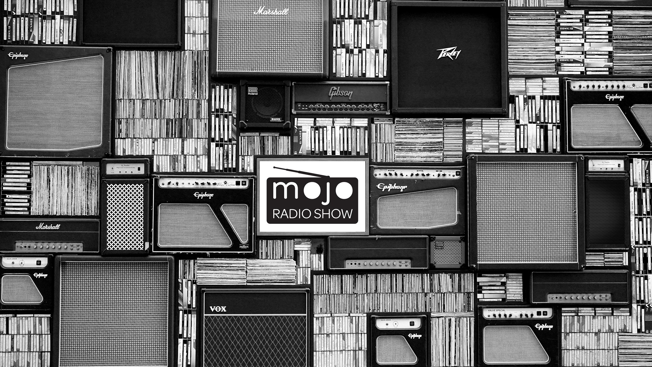Stacked amps, records, CDs and Mojo Radio Show logo